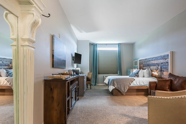 1 King Bed Deluxe Suite Electric Fireplace Photo 1